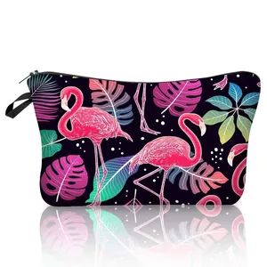 Close-up of tropical flamingo pattern on black polyester makeup bag with zipper