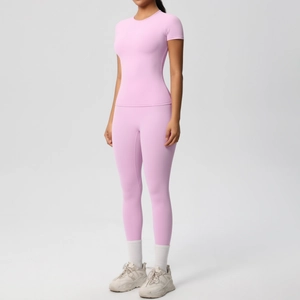Detail of high-elasticity pink sports set with seamless knitting and breathable fabric