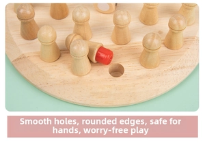 Macro detail of wooden memory chess pieces with red color markings on smooth round board