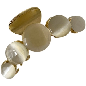 Elegant gold metal hair claw clip featuring curved opal stones for women hair accessories