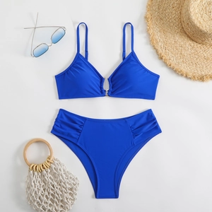 Royal blue bikini set with metal ring detail and high-waisted ruched bottoms for summer