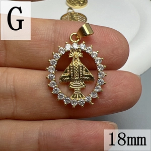 Detailed close-up of 18mm golden Guadalupe pendant with sparkling cubic zirconia stones