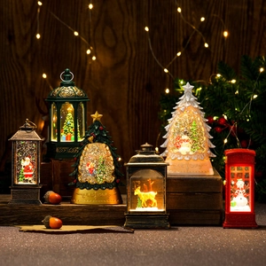 Christmas LED lantern decorations set with Santa and reindeer on rustic wooden stand