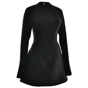 Detail showing the elegant back button closure and high neck design of this black dress