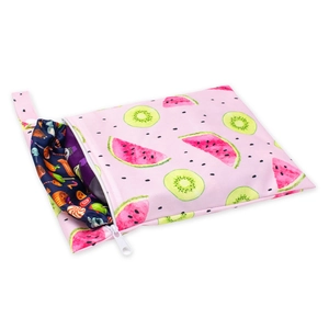 Detail of pink waterproof diaper bag featuring kiwi and watermelon prints with zipper