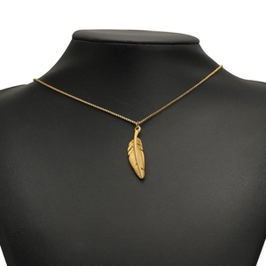 18K gold plated stainless steel necklace with detailed feather pendant on black mannequin