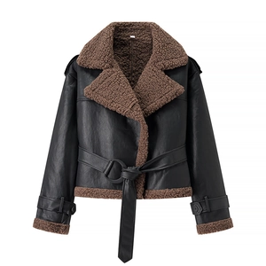 Detail of faux shearling collar and black leather texture on cropped biker jacket
