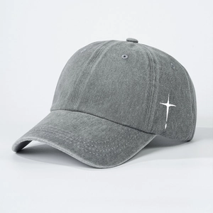 Unisex grey washed cotton baseball cap with white cross embroidery in 45-degree side view