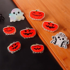 Halloween pumpkin and ghost hair claw set with holographic laser finish for women