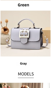Close-up of elegant small square handbags with gold buckles in purple and grey PU leather