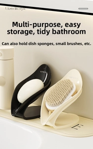 Uforu leaf-shaped self-draining soap dish holding sponges on a bathroom counter