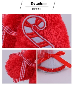 Detail showing red plush fabric, candy cane embroidery, and plaid ribbon on Christmas doll