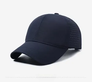 Detail of dark blue quick-dry baseball cap featuring laser-cut ventilation holes for cooling
