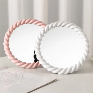 Adjustable desktop vanity mirror with cream twisted rope frame in pink and white