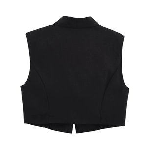 Back view of black sleeveless vest with tailored waist and elegant split hemline detail