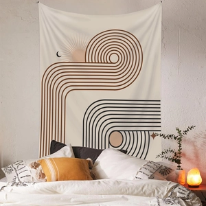 Detail of bohemian wall tapestry with geometric sun and moon patterns for room decor