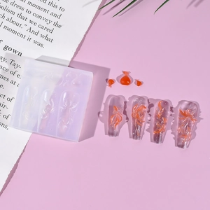 Detailed view of 3D silicone nail art mold featuring goldfish and lily flower reliefs