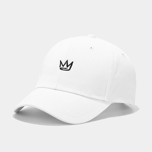 Close-up of black crown embroidery on a premium white cotton twill baseball cap detail
