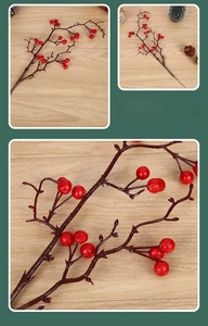 Close-up of artificial red berries with realistic branch texture for home decor