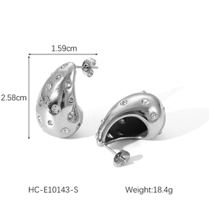 Detailed view of silver teardrop earrings with crystals and size specs 1.59cm by 2.58cm
