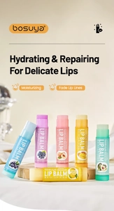 Hydrating fruit lip balm set with Vitamin E and honey shown on a rustic wood plate