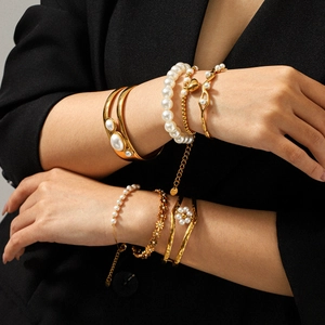 Ensemble de bracelets en perles vintage en acier titane plaqué or 18 carats