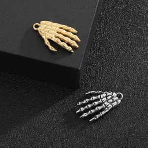 Vintage stainless steel skeleton hand pendants in gold and silver for DIY jewelry