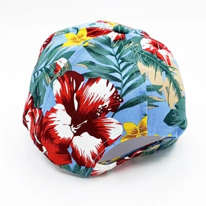 Sky blue baseball cap with tropical floral print and adjustable back buckle for women
