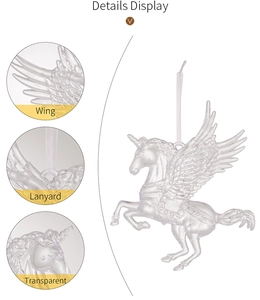 Detail view of transparent unicorn Christmas ornament wings and lanyard attachment