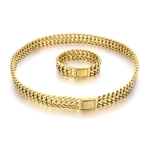 Polished gold stainless steel jewelry set featuring woven chain necklace and bracelet