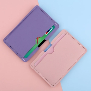 Slim lychee texture card holder for women in purple and pink minimalist faux leather