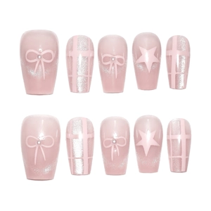 Pink cat eye press-on nails set with 3D bows, star patterns and glitter finish