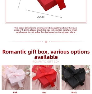 Detail of 22cm heart-shaped gift boxes with satin ribbons in pink, red, and black