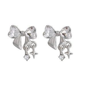 Elegant silver bow earrings with heart-shaped crystals and star-shaped pendant drops