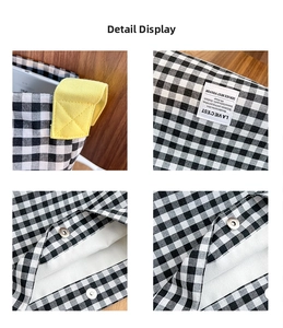 Détail du sac cabas à carreaux avec poignée jaune, fermoir aimanté et intérieur spacieux