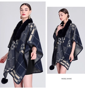 Detail view of the elegant faux rabbit fur collar and plaid knit poncho cape for women