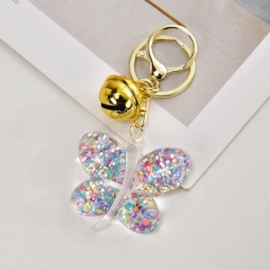 Cute transparent acrylic butterfly keychain with colorful sequins and golden bell