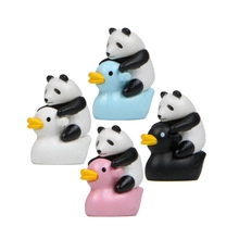 Set of four cute panda riding duck figurines in white, blue, pink, and black finishes