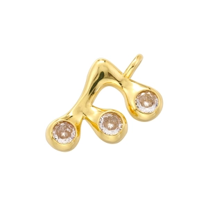 Detailed close-up of 18K gold plated eighth note pendant with sparkling white rhinestones