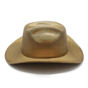 Detail of a sparkling gold sequin cowboy hat with metallic finish and wide brim design