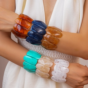 Colorful chunky acrylic block stretch bracelet with marble patterns for a resort style look