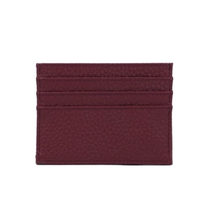 Macro detail of wine red lychee grain leather wallet with multiple card slots