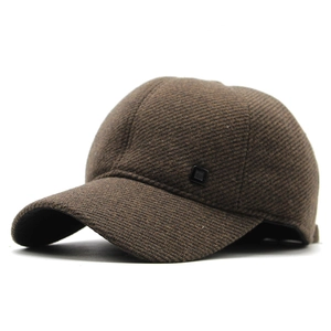 Detailed side view of high-density brown twill wool texture and square embossed badge
