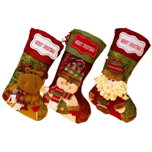 Three-piece Christmas stocking set featuring Santa, snowman and elk hanging gift bags