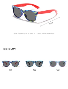 Detailed dimensions of children's dinosaur sunglasses with CE marks and color options