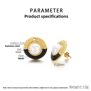 Detail view of 20mm French pearl earrings in gold stainless steel and black resin
