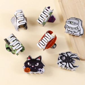 Lot de 7 pinces à cheveux Halloween avec citrouille, chat noir et momie sur fond beige clair