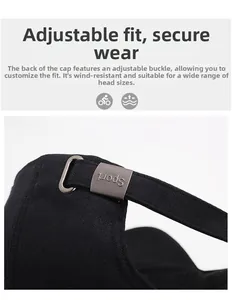Detail of adjustable metal buckle with Sport embossing on black twill baseball cap