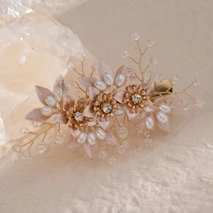 Elegant bridal sunflower hair clip with champagne gold petals, pearls and crystals