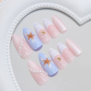 Ocean theme press-on nails with pink blue gradient, pearls and starfish 3D designs